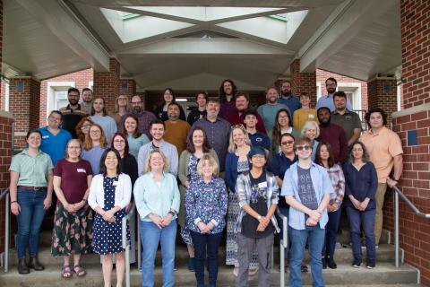 a group photo of the EBTA 2025 Cohort on the front steps of the Shields building
