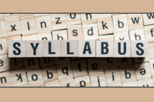 Lettered blocks arranged to spell out the word, "syllabus"